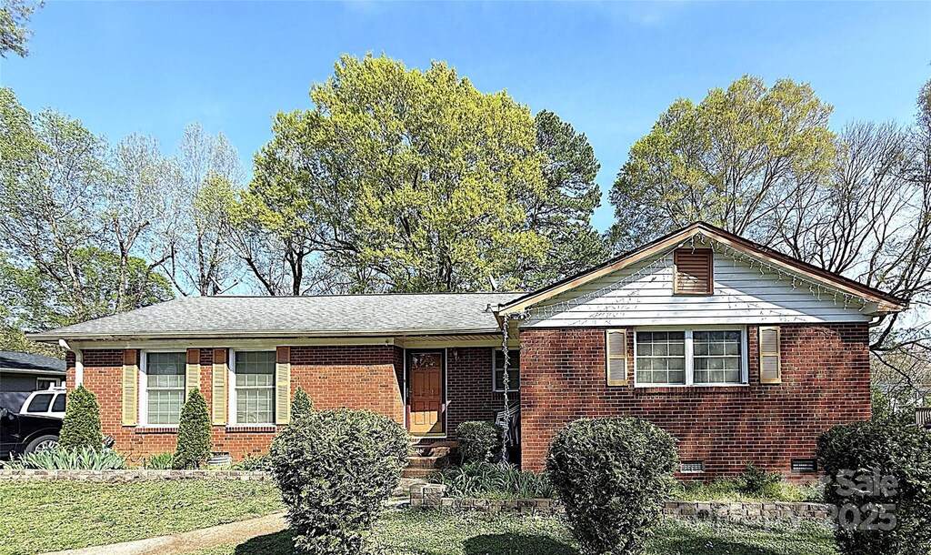 3220 Wiseman Dr, Charlotte, NC 28227 - single story home with brick siding, a shingled roof, and crawl space