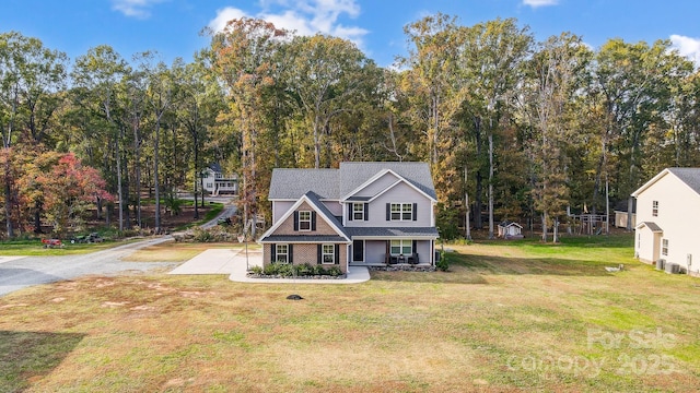 3018 Corinth Church Rd, Monroe, NC 28112 - traditional-style house with a front lawn and covered porch