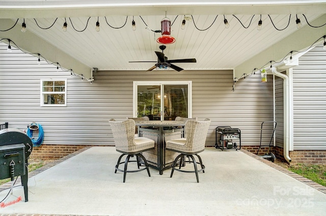 3018 Corinth Church Rd, Monroe, NC 28112 - view of patio featuring a ceiling fan, outdoor dining area, and grilling area