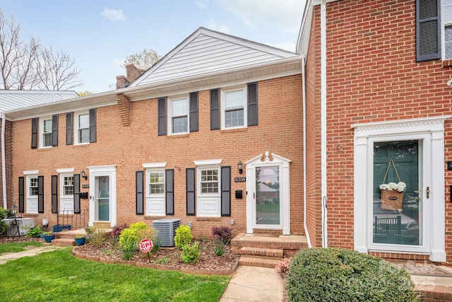 8308 Knights Bridge Rd, Charlotte, NC 28210 - view of property with brick siding and central air condition unit