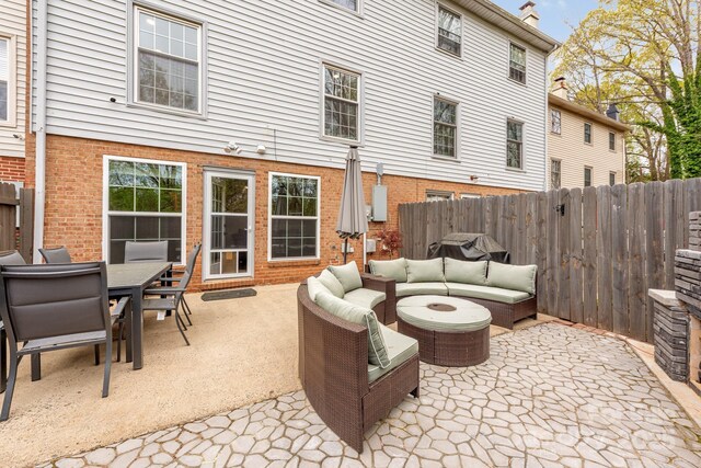 8308 Knights Bridge Rd, Charlotte, NC 28210 - view of patio featuring fence private yard, outdoor dining space, and an outdoor living space