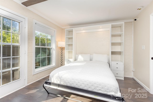8308 Knights Bridge Rd, Charlotte, NC 28210 - bedroom with baseboards and wood finished floors