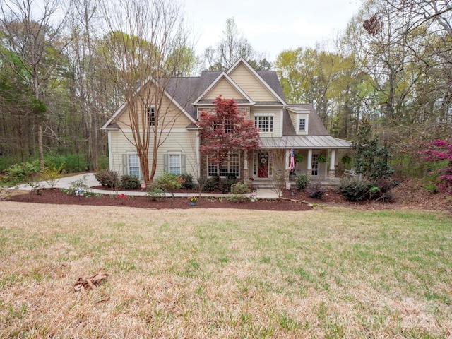 6108 Mcilwaine Rd, Huntersville, NC 28078 - view of front facade featuring a front lawn and covered porch