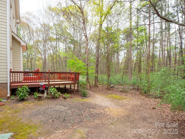 6108 Mcilwaine Rd, Huntersville, NC 28078 - view of yard with a deck and a wooded view