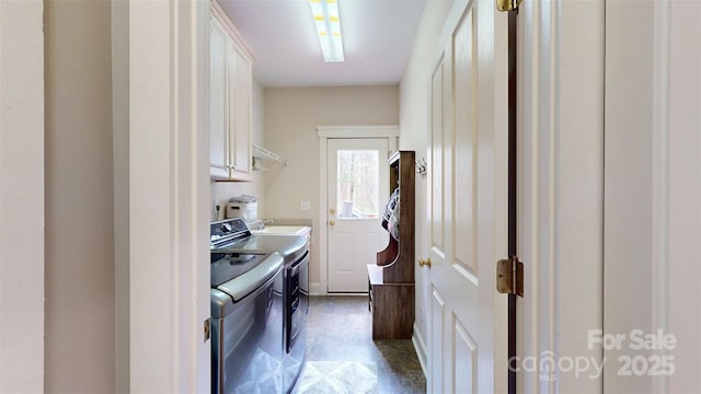 6108 Mcilwaine Rd, Huntersville, NC 28078 - clothes washing area featuring separate washer and dryer and cabinet space