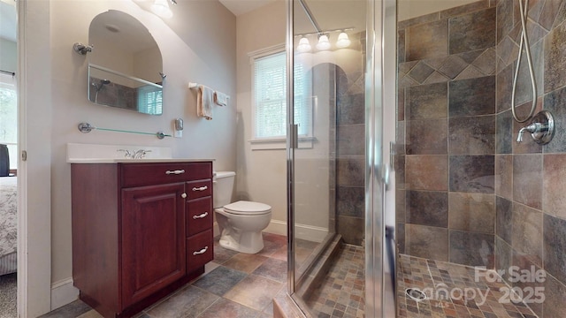 6108 Mcilwaine Rd, Huntersville, NC 28078 - full bath featuring baseboards, toilet, vanity, and a stall shower