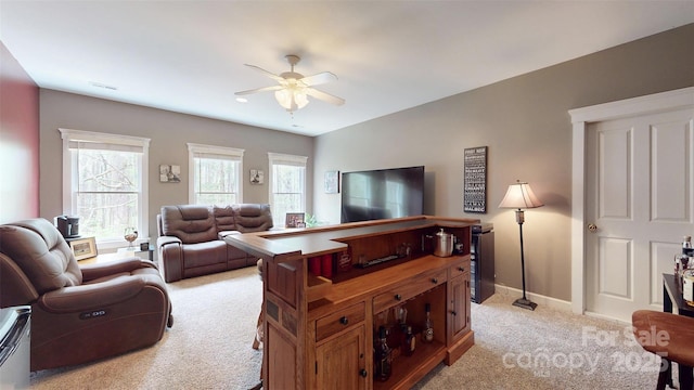 6108 Mcilwaine Rd, Huntersville, NC 28078 - living area with light colored carpet, baseboards, a ceiling fan, and visible vents