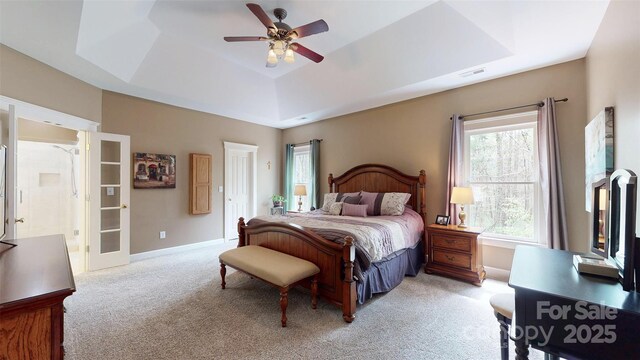 6108 Mcilwaine Rd, Huntersville, NC 28078 - bedroom featuring a ceiling fan, a raised ceiling, light colored carpet, baseboards, and visible vents