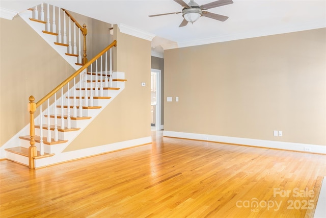 19113 Southport Dr, Cornelius, NC 28031 - interior space featuring baseboards, a ceiling fan, wood finished floors, and ornamental molding