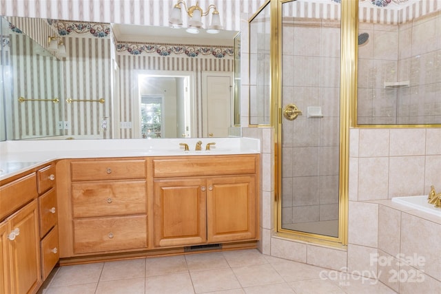 19113 Southport Dr, Cornelius, NC 28031 - bathroom with tile patterned floors, visible vents, a shower stall, a garden tub, and vanity