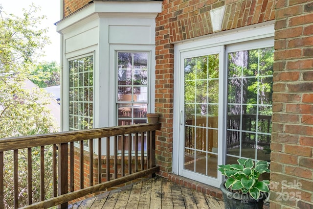 19113 Southport Dr, Cornelius, NC 28031 - exterior space featuring a wooden deck and brick siding