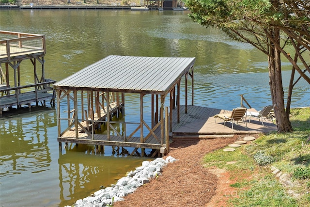 view of dock with a water view