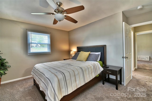 bedroom with carpet floors, a ceiling fan, and baseboards