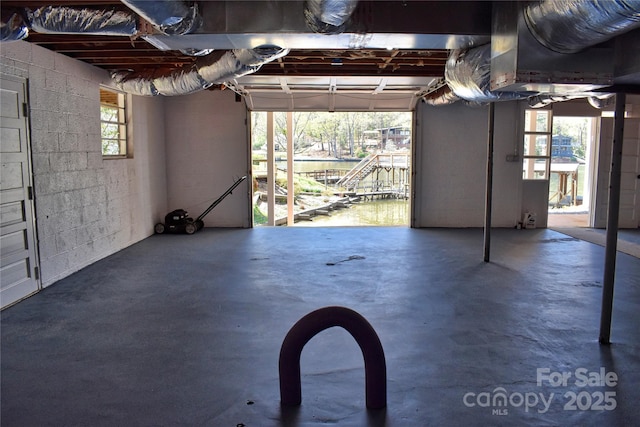 garage with concrete block wall
