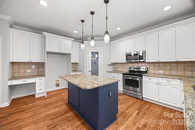 206 Coburn Ct, Fort Mill, SC 29715 - kitchen featuring appliances with stainless steel finishes, white cabinetry, decorative light fixtures, backsplash, and recessed lighting