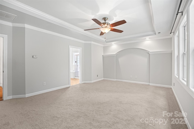 206 Coburn Ct, Fort Mill, SC 29715 - unfurnished room with a tray ceiling, ceiling fan, light carpet, and ornamental molding