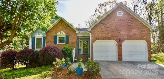 view of front of house with driveway, brick siding, and an attached garage
