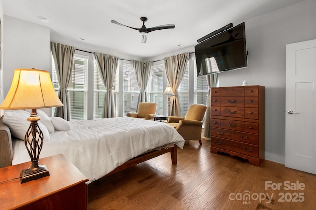 324 Uptown W Dr, Charlotte, NC 28208 - bedroom featuring a ceiling fan and wood finished floors