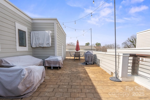 324 Uptown W Dr, Charlotte, NC 28208 - view of patio / terrace featuring a grill and outdoor dining area