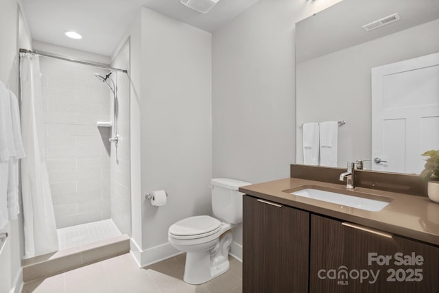 324 Uptown W Dr, Charlotte, NC 28208 - full bath featuring toilet, vanity, a tile shower, and visible vents