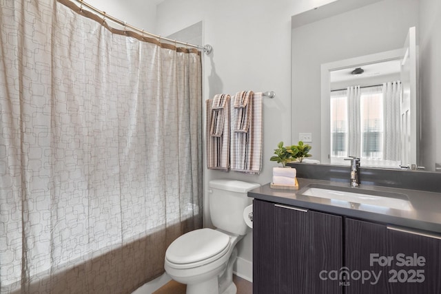 324 Uptown W Dr, Charlotte, NC 28208 - bathroom with shower / bath combination with curtain, toilet, and vanity