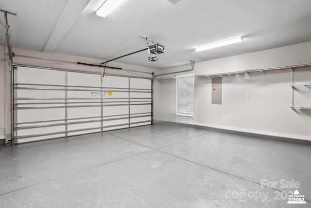 324 Uptown W Dr, Charlotte, NC 28208 - garage featuring a garage door opener and electric panel