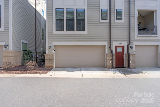 324 Uptown W Dr, Charlotte, NC 28208 - view of front of home featuring a garage