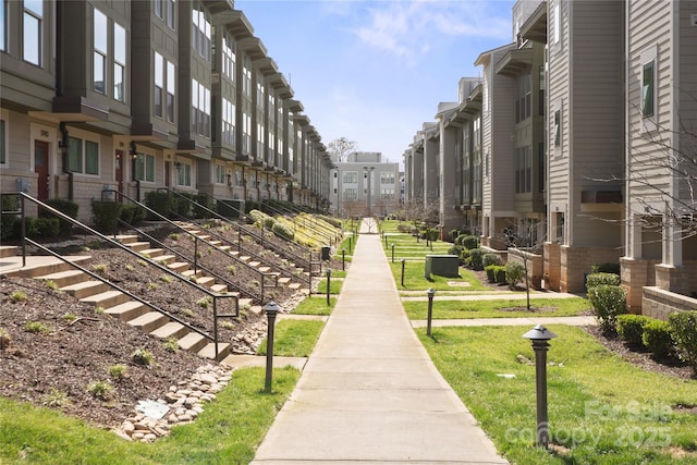 324 Uptown W Dr, Charlotte, NC 28208 - view of community featuring a lawn
