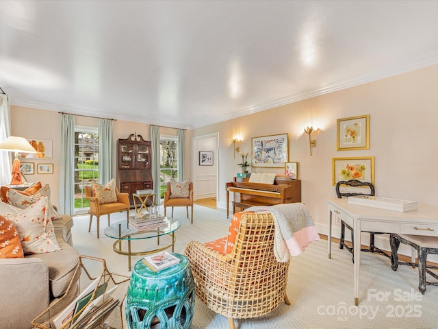 living area with carpet flooring and crown molding