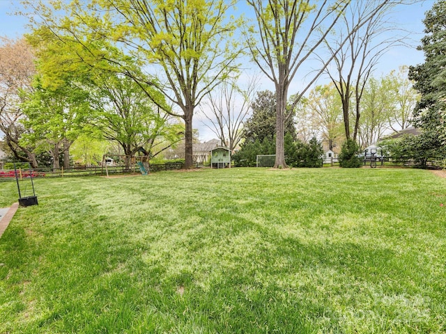view of yard with fence