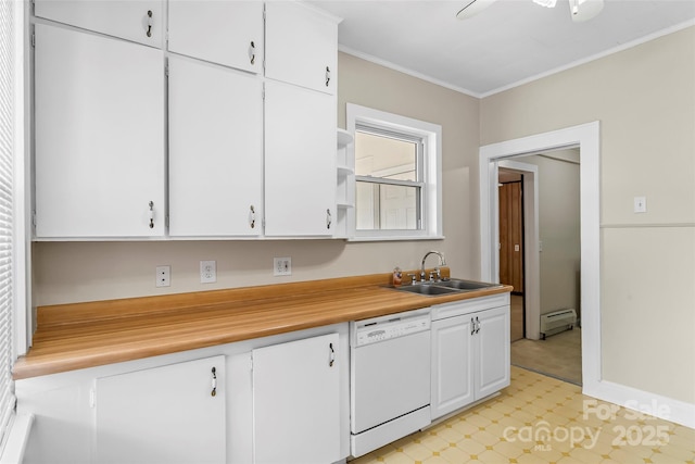 kitchen featuring dishwasher, a sink, crown molding, white cabinetry, and a baseboard heating unit