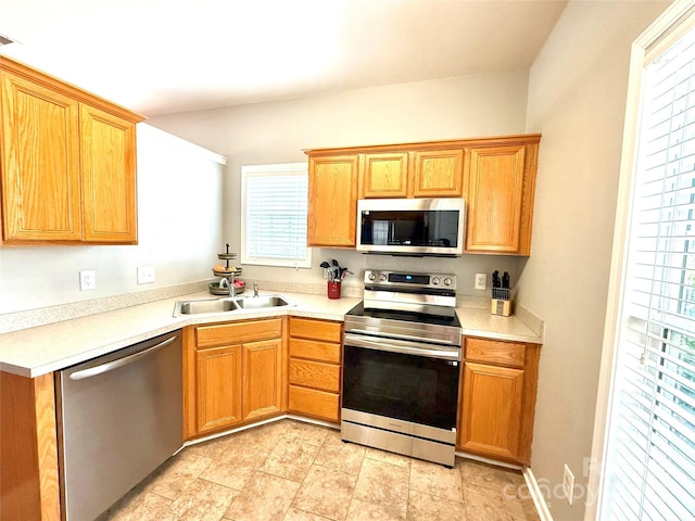 4130 Town Center Rd, Harrisburg, NC 28075 - kitchen with stainless steel appliances, a sink, and light countertops