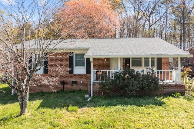 394 Efird St, Gastonia, NC 28054 - view of front of property with a porch, a shingled roof, a front lawn, and brick siding