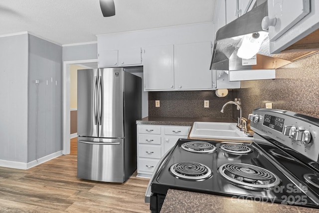 394 Efird St, Gastonia, NC 28054 - kitchen with tasteful backsplash, crown molding, a sink, white cabinets, and appliances with stainless steel finishes