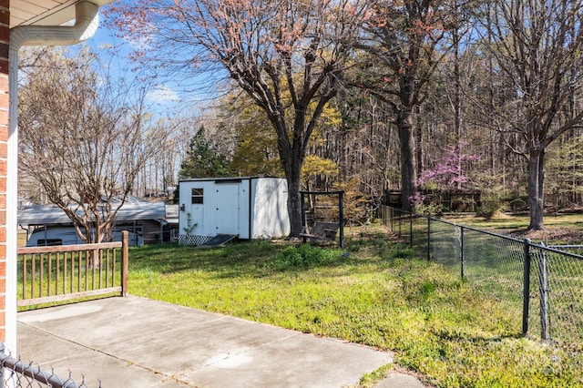 394 Efird St, Gastonia, NC 28054 - view of yard with fence, an outbuilding, a patio area, and a storage unit