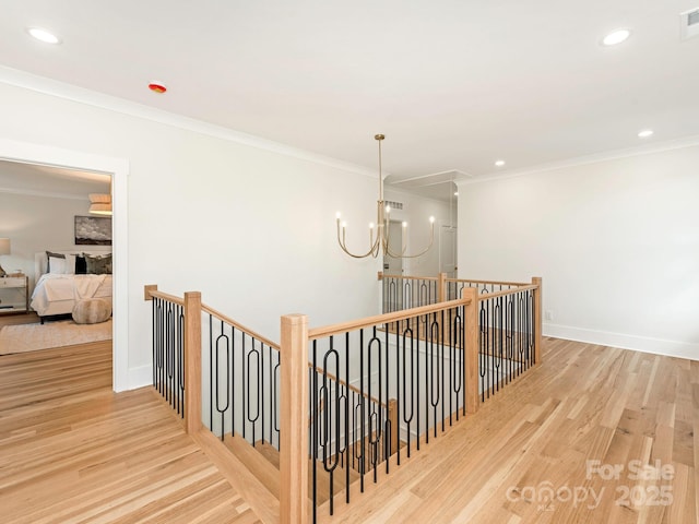 2909 Hanson Dr, Charlotte, NC 28207 - stairway with recessed lighting, baseboards, crown molding, and wood finished floors