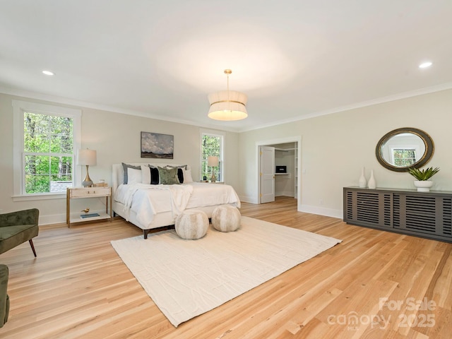 2909 Hanson Dr, Charlotte, NC 28207 - bedroom featuring crown molding, baseboards, and light wood-type flooring