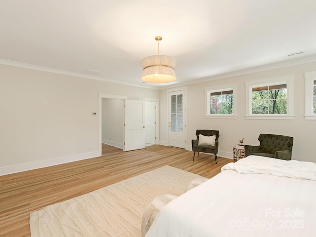 2909 Hanson Dr, Charlotte, NC 28207 - bedroom with baseboards, light wood-type flooring, crown molding, and visible vents