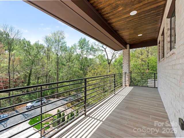 2909 Hanson Dr, Charlotte, NC 28207 - wooden deck with a forest view