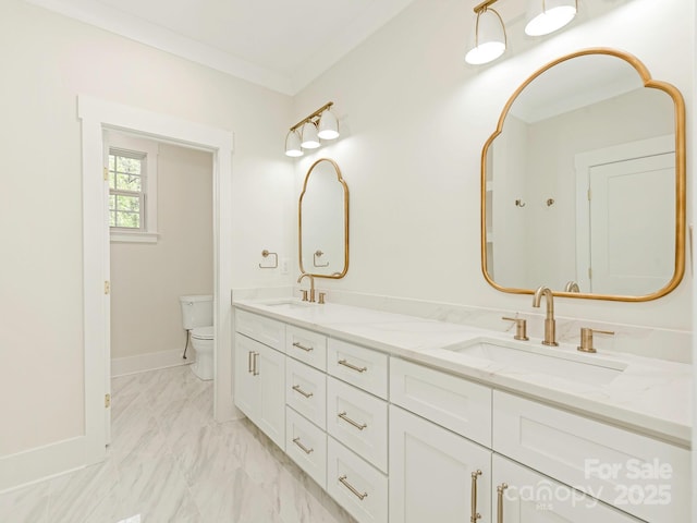 2909 Hanson Dr, Charlotte, NC 28207 - bathroom featuring marble finish floor, a sink, toilet, and crown molding