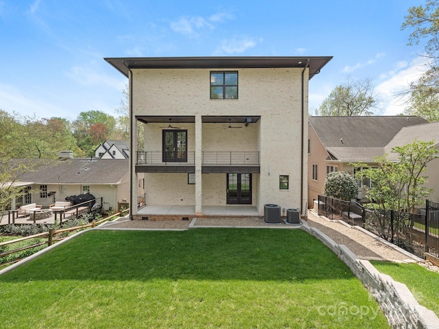 2909 Hanson Dr, Charlotte, NC 28207 - back of house featuring a patio area, central AC unit, fence, and a lawn