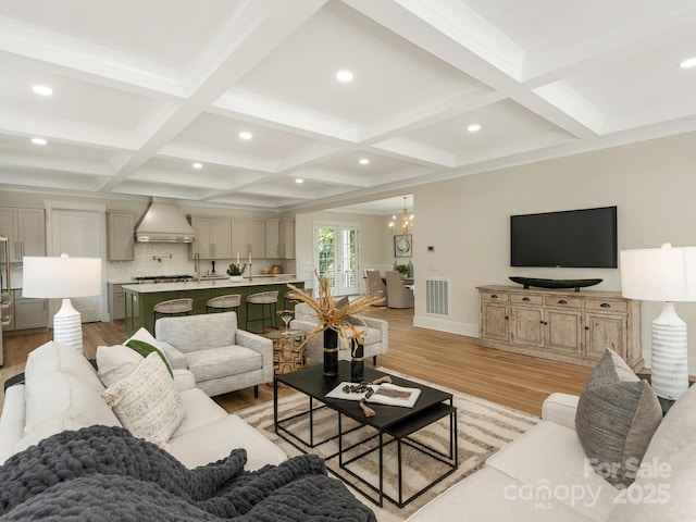 2909 Hanson Dr, Charlotte, NC 28207 - living area with recessed lighting, light wood finished floors, visible vents, and beamed ceiling