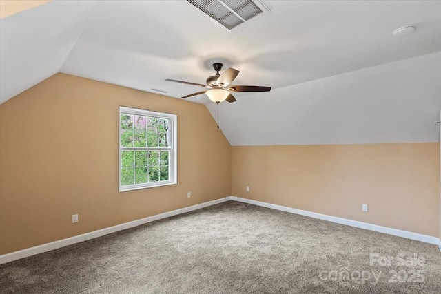 bonus room with visible vents, ceiling fan, carpet, and lofted ceiling