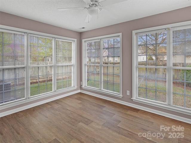135 S Sunberry Trl, Fletcher, NC 28732 - interior space featuring ceiling fan, a textured ceiling, visible vents, wood finished floors, and baseboards