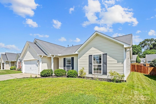 ranch-style house with fence, a garage, a front lawn, and driveway