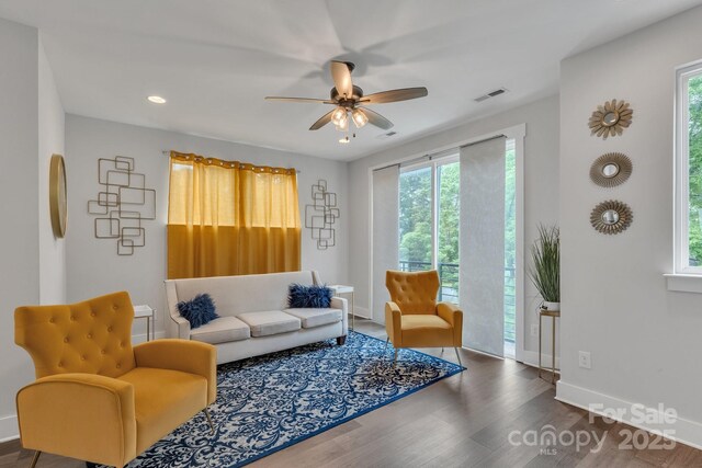 648 W End Dr, Charlotte, NC 28208 - living room featuring plenty of natural light, wood finished floors, ceiling fan, baseboards, and recessed lighting