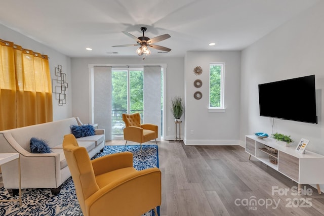 648 W End Dr, Charlotte, NC 28208 - living area featuring plenty of natural light, wood finished floors, a ceiling fan, baseboards, and recessed lighting