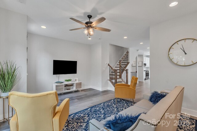 648 W End Dr, Charlotte, NC 28208 - living room featuring stairway, wood finished floors, baseboards, ceiling fan, and recessed lighting