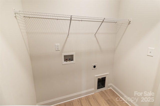 615 Billingsley Rd, Charlotte, NC 28211 - clothes washing area with baseboards, laundry area, light wood-style flooring, electric dryer hookup, and hookup for a washing machine