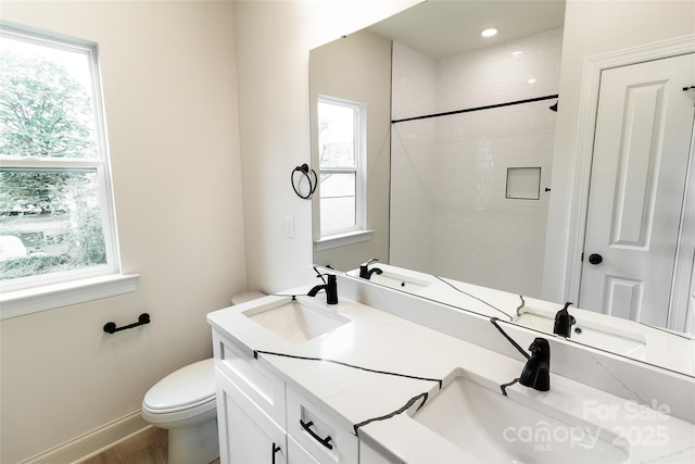 615 Billingsley Rd, Charlotte, NC 28211 - bathroom with baseboards, a sink, and toilet